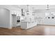 Spacious kitchen featuring a large island, modern appliances, and stylish pendant lighting at 2872 Edenborough Rd, Johns Island, SC 29455