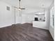 Living room with hardwood floors and recessed lighting showcasing bright living space with access to kitchen at 2910 John Cabot Dr, North Charleston, SC 29420