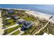 Drone shot of a coastal estate with ocean access and pristine beach at 3004 Point St, Edisto Island, SC 29438