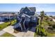 Charming raised beach house with stairs, porch, and scenic ocean views at 3004 Point St, Edisto Island, SC 29438