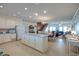 Open floor plan with kitchen island and view of dining and living areas at 3004 Point St, Edisto Island, SC 29438