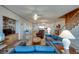 Bright living room features comfortable seating and staircase to the upper level at 3004 Point St, Edisto Island, SC 29438