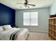 Tranquil bedroom featuring a comfortable bed, window, and ample storage at 3006 Central Ring Ct, Ridgeville, SC 29472