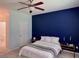 Comfortable bedroom featuring a ceiling fan, bedside tables, and a calming color scheme at 3006 Central Ring Ct, Ridgeville, SC 29472