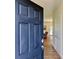Open front entry featuring wood-look flooring, neutral walls, and a view into the inviting living spaces at 3006 Central Ring Ct, Ridgeville, SC 29472