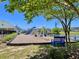 The community playground is shaded by mature trees and beside a pond at 3006 Central Ring Ct, Ridgeville, SC 29472