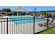 Cool off in the community pool, surrounded by ample seating and a secure fence at 3006 Central Ring Ct, Ridgeville, SC 29472