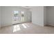 Bright bedroom with a door leading to a balcony, and neutral carpeting at 314 O'Malley Dr, Summerville, SC 29483