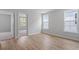 Bright bedroom with a hardwood floor, natural light, and a connecting door at 314 O'Malley Dr, Summerville, SC 29483