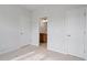 Bedroom with neutral walls and carpet, featuring a door leading to bathroom at 314 O'Malley Dr, Summerville, SC 29483