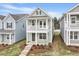 Charming two-story home featuring a welcoming front porch and second story balcony at 314 O'Malley Dr, Summerville, SC 29483