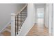 Bright hallway with wood floors and staircase leading to the upper level at 314 O'Malley Dr, Summerville, SC 29483