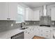 Kitchen view with white cabinets, stainless steel appliances, light countertops, and a subway tile backsplash at 314 O'Malley Dr, Summerville, SC 29483