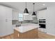 Bright kitchen with stainless steel appliances, white cabinets, and a center island at 314 O'Malley Dr, Summerville, SC 29483