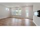 Bright and spacious living room with multiple windows and a glass door that fills the room with natural light at 314 O'Malley Dr, Summerville, SC 29483