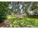 Spacious backyard featuring a patio seating area and lush, green lawn, perfect for outdoor enjoyment at 4587 Durant Ave, North Charleston, SC 29405