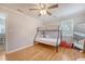 This cozy bedroom offers a bunk bed and hardwood floors, with abundant natural light to brighten the space at 4587 Durant Ave, North Charleston, SC 29405