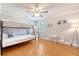 Bright bedroom with bunk beds, hardwood floors, and decoratively painted walls for a fun and inviting space at 4587 Durant Ave, North Charleston, SC 29405