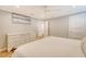 Cozy bedroom with light walls, hardwood floors, and an en-suite bathroom for added convenience at 4587 Durant Ave, North Charleston, SC 29405
