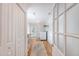 Mudroom with white cabinets and hardwood floors, offering a practical transition space from outdoors at 4587 Durant Ave, North Charleston, SC 29405
