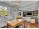 Open-concept kitchen and living room with stylish light fixtures and modern finishes at 49 Ashley Ave, Charleston, SC 29401