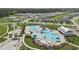 Beautiful aerial view of a Primary-planned community highlighting the resort-style pool with water slide and well-maintained landscaping at 491 Cedarview Rd, Summerville, SC 29486