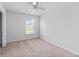 Cozy bedroom featuring a ceiling fan, neutral carpet, one window, and light gray walls at 491 Cedarview Rd, Summerville, SC 29486