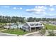 Stunning community pool area featuring a clubhouse, pools, lounge chairs, and cabanas surrounded by lush landscaping at 491 Cedarview Rd, Summerville, SC 29486