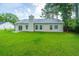 Expansive backyard with a well-maintained lawn, perfect for outdoor activities and entertaining at 5023 Manor Rd, Hollywood, SC 29449