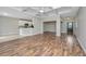 Spacious open floor plan with coffered ceiling and combined kitchen and living area at 5023 Manor Rd, Hollywood, SC 29449