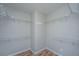 Spacious walk-in closet with wire shelving for ample storage, ready for organizing at 5023 Manor Rd, Hollywood, SC 29449