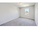 Bedroom with neutral carpet, natural light, and a soothing color palette at 504 Sarno Way, Summerville, SC 29486
