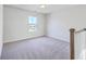 Bonus room offers neutral carpet, natural light, and modern color palette at 504 Sarno Way, Summerville, SC 29486