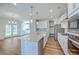 Open kitchen featuring stainless steel appliances, a breakfast bar and a view to the yard at 504 Sarno Way, Summerville, SC 29486