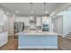 New kitchen features stainless steel appliances, quartz countertops and a breakfast bar at 504 Sarno Way, Summerville, SC 29486