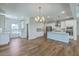 Open concept living room and kitchen featuring a breakfast bar at 504 Sarno Way, Summerville, SC 29486