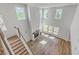 Aerial view of the living room featuring a fireplace, wood floors and plenty of natural light at 504 Sarno Way, Summerville, SC 29486