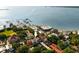 Overhead view of this property near a harbor, beach, and cityscape, with a boat dock at 55 E Bay St, Charleston, SC 29401