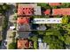 An overhead view that highlights a street with homes, trees, and a unique perspective of the neighborhood at 55 E Bay St, Charleston, SC 29401