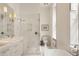 Bright bathroom boasts marble shower, sleek vanity, and luxurious soaking tub, perfect for relaxation at 55 E Bay St, Charleston, SC 29401