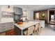 Bright kitchen features stainless appliances, an island with seating, and stylish decor for an inviting atmosphere at 55 E Bay St, Charleston, SC 29401