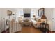 Comfortable living room with neutral decor and large windows providing natural light at 55 E Bay St, Charleston, SC 29401