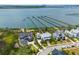 Aerial view of waterfront homes with private docks and scenic water views at 553 Old Compass Rd, Daniel Island, SC 29492