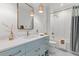 Elegant bathroom featuring a stylish vanity with designer fixtures and a bathtub at 553 Old Compass Rd, Daniel Island, SC 29492