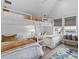 Bright bedroom featuring a unique triple bunk bed and a cozy window bench at 553 Old Compass Rd, Daniel Island, SC 29492