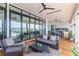 Spacious covered patio with comfortable seating and water views, perfect for relaxing outdoors at 553 Old Compass Rd, Daniel Island, SC 29492