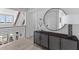 Upstairs hallway featuring a sleek console table and an elegant mirror at 553 Old Compass Rd, Daniel Island, SC 29492