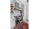 Gourmet kitchen with high-end appliances, designer backsplash, and custom cabinetry at 553 Old Compass Rd, Daniel Island, SC 29492