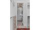 Access to laundry room from the walk-in closet, with washer and dryer at 553 Old Compass Rd, Daniel Island, SC 29492