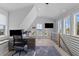 Bright home office with water views, vaulted ceilings, a large desk, and modern finishes at 553 Old Compass Rd, Daniel Island, SC 29492